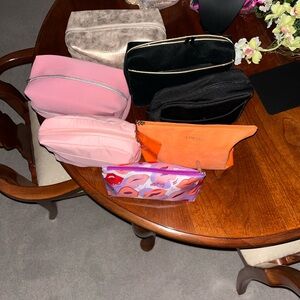 Various Cosmetic Pouches with product -details in live show